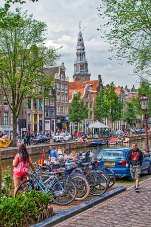 AMSTERDAM, NETHERLANDS - JULY 8, 2017: People visit Red Light District in Amsterdam, Netherlands. Amsterdam is notable for its relaxed laws towards prostitution.のeditorial素材