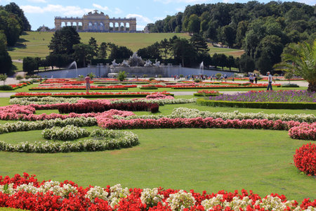 VIENNA, AUSTRIA - SEPTEMBER 6, 2011: People visit Schoenbrunn gardens in Vienna. Palace and Gardens of Schonbrunn are listed as UNESCO World Heritage Site.のeditorial素材