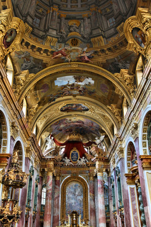 VIENNA, AUSTRIA - SEPTEMBER 9, 2011: Interior of Jesuit Church in Vienna. The building was completed in 1627 and is a remarkable example of baroque architecture.のeditorial素材