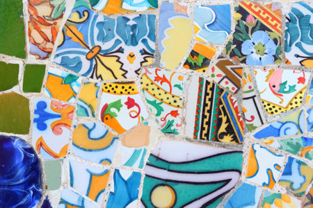 BARCELONA, SPAIN - NOVEMBER 6, 2012: Mosaic art of Park Guell in Barcelona, Spain. It was built in...