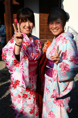 KYOTO, JAPAN - NOVEMBER 26, 2016: Women in traditional kimono costume visit Higashiyama old town in Kyoto, Japan. Kyoto has 17 UNESCO World Heritage Sites.のeditorial素材