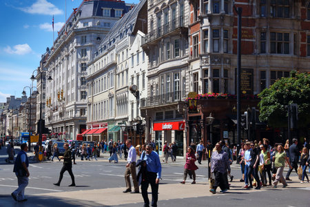 LONDON, UK - JULY 6, 2016: People walk along The Strand in London, UK. London is the most populous city in the UK with 13 million people living in its metro area.のeditorial素材