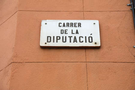 Carrer de la Diputacio street name sign in Barcelona. Famous streets of Barcelona, Spain.の写真素材