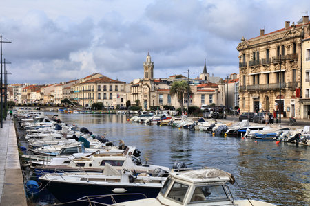 SETE, FRANCE - OCTOBER 2, 2021: Canal view in downtown Sete, France. Sete is a famous harbor town in Herault department of France.のeditorial素材