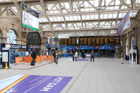SHEFFIELD, UK - JULY 10, 2016: Passengers wait at Sheffield Station in the UK. The railway station was used by 9.1 million passengers in 2014.のeditorial素材