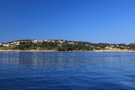 Lumbarda townscape in Korcula island, Croatia. Fishing harbor morning.の写真素材