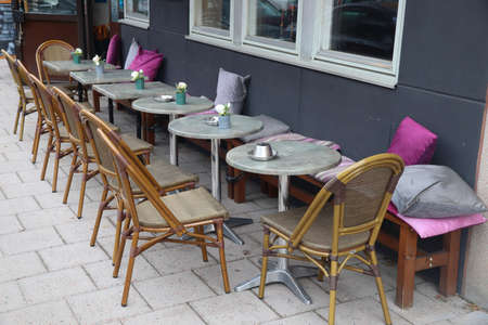Sidewalk cafe. Outdoor cafe tables in Stockholm city, Sweden.