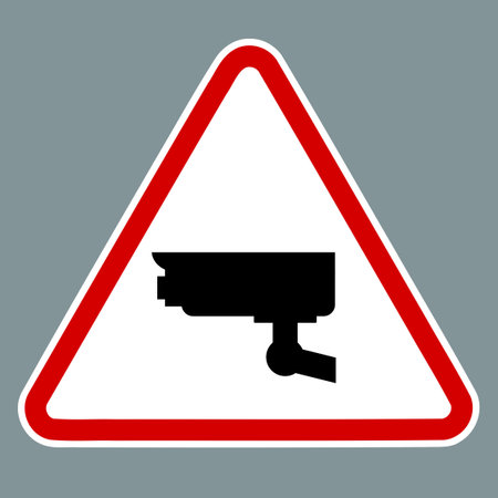 CCTV warning sign. Vector sticker design for security camera CCTV warning.のイラスト素材