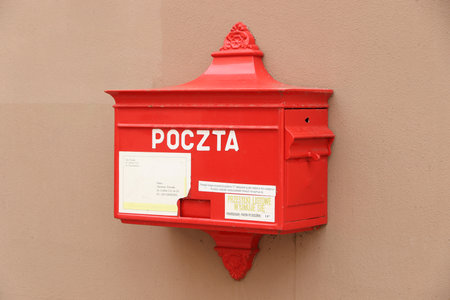 WROCLAW, POLAND - SEPTEMBER 2, 2018: Post box of Poczta Polska in a street of Wroclaw Old Town....
