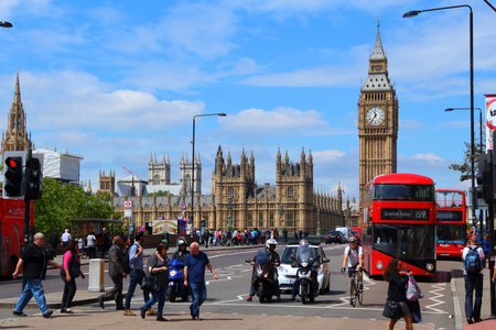 LONDON, UK - JULY 7, 2016: People walk near Big Ben in London, UK. London is the most populous city in the UK with 13 million people living in its metro area.のeditorial素材