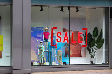LONDON, UK - JULY 13, 2019: Next brand fashion store in the City of London. Next Plc is a British clothes and footwear brand.のeditorial素材