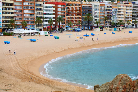 Lloret de Mar beach cityscape in Spain. View on a cloudy, rainy day.