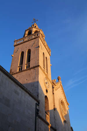Croatia Korcula Town. Cathedral of St. Mark - Roman Catholic Romanesque style landmark. Sunset...