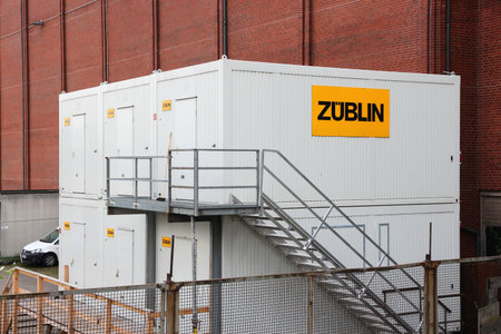 HAMBURG, GERMANY - AUGUST 29, 2014: Construction site modular office containers of Zublin company in Germany. The construction company Zublin is part of Strabag group.のeditorial素材