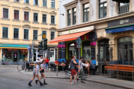 DRESDEN, GERMANY - MAY 10, 2018: People visit restaurants in Neustadt district of Dresden. Neustadt is a hip district of quirky restaurants and alternative shopping.のeditorial素材