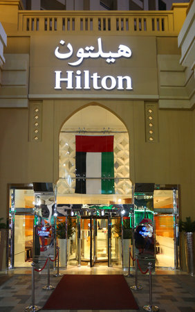 DUBAI, UAE - NOVEMBER 23, 2017: Hilton Hotel entrance in Dubai Marina district, UAE. Dubai is the most populous city in UAE and a major global city.のeditorial素材