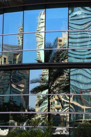 Dubai Marina architecture glass reflection. Dubai city, United Arab Emirates.