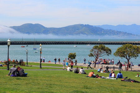 SAN FRANCISCO, USA - APRIL 8, 2014: People visit Aquatic Park in San Francisco, USA. San Francisco is the 4th most populous city in California (837,442 people in 2013).のeditorial素材