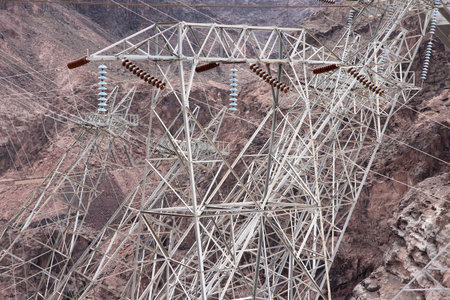High voltage power lines around Dam, USA.