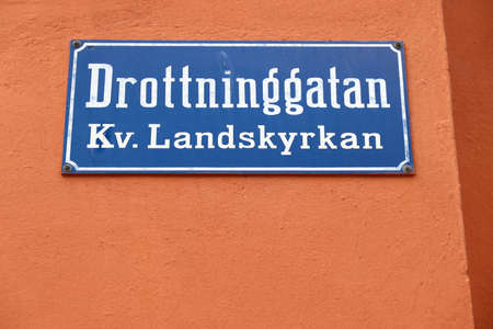 Norrkoping town in Sweden. Drottninggatan street name sign.