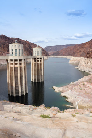 Hoover Dam in United States. Hydroelectric power station on the border of Arizona and Nevada. Low level water reservoir.のeditorial素材