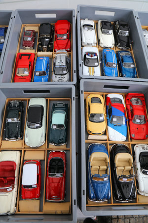 KLAGENFURT, AUSTRIA - AUGUST 12, 2022: Diecast collectible car models in popular 1:18 scale at Altstadtsauber flea market in Klagenfurt, Austria.のeditorial素材