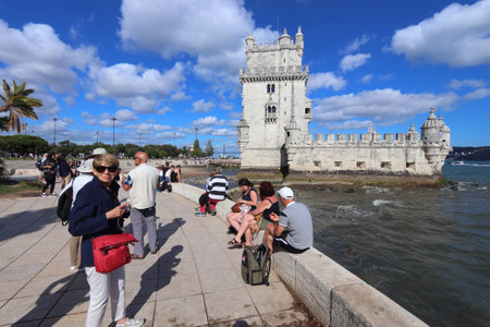 LISBON, PORTUGAL - JUNE 5, 2018: People visit Torre de Belem Fortification on Tagus River in Lisbon, Portugal. Lisbon is the 11th-most populous urban area in the EU (2.8 million people).のeditorial素材