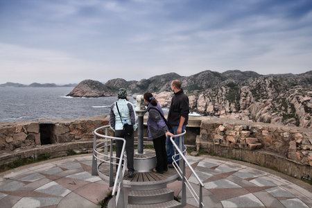 LINDESNES, NORWAY - AUGUST 10, 2010: Tourists visit a viewpoint in Lindesnes, Norway. Lindesnes is the southernmost mainland point of Norway.のeditorial素材