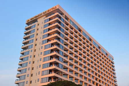 BANGKOK, THAILAND - DECEMBER 21, 2013: Mandarin Oriental hotel in Bangkok in sunset light. Mandarin Oriental Hotel Group focuses on luxury properties. It is owned by Jardine Matheson Holdings.のeditorial素材