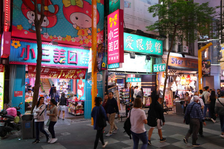 TAIPEI, TAIWAN - DECEMBER 3, 2018: People visit Ximending shopping district in Taipei. Ximending is considered one of top shopping destinations in Taiwan, catering especially youth shoppers.のeditorial素材