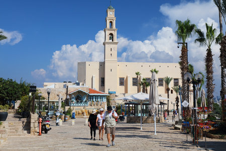 TEL AVIV, ISRAEL - NOVEMBER 2, 2022: People visit Kikar Kedumim square in Jaffa Old Town in Tel Aviv, Israel. Tel Aviv is the economic and technological center of Israel.のeditorial素材