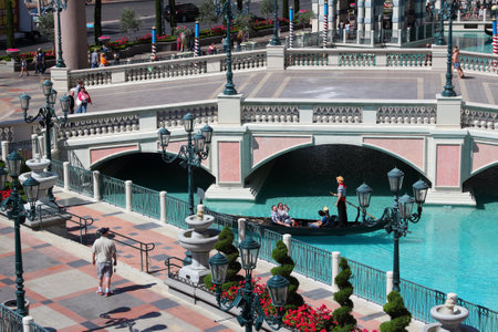 LAS VEGAS, USA - APRIL 14, 2014: People visit The Venetian resort canals in Las Vegas. It is one of 10 largest hotels in the world with 4,409 rooms.のeditorial素材