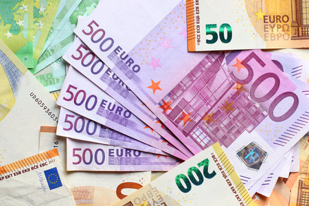 Euro currency banknotes background. European paper money backdrop with 100, 200 and 500 euros bills.の写真素材