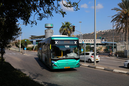 HAIFA, ISRAEL - NOVEMBER 1, 2022: Bus drives out of Hof HaKarmel Central Station in Haifa, Israel....