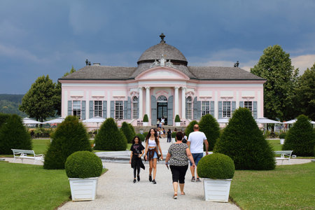 MELK, AUSTRIA - AUGUST 1, 2022: Tourists visit baroque garden pavilion of Stift Melk (Melk Abbey) in Wachau region of Austria. The Benedictine abbey is a recognized monument of architecture in Lower Austria.のeditorial素材
