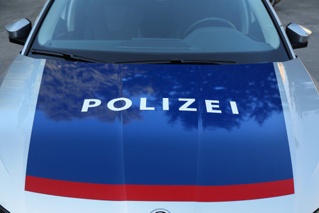 SALZBURG, AUSTRIA - AUGUST 4, 2022: Austrian Police Skoda Octavia car parked in Salzburg, Austria.のeditorial素材