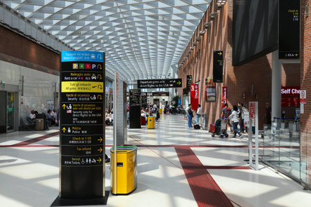 VENICE, ITALY - MAY 22, 2023: Passengers visit Venice Marco Polo Airport terminal in Italy. It is a major international airport serving Venice.のeditorial素材