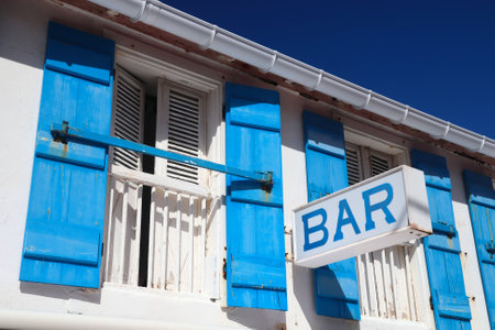 Bar sign - generic cafe bar in Guadeloupe. Creole style colors of building.の写真素材