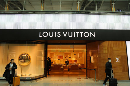 SEOUL, SOUTH KOREA - APRIL 10, 2023: Passengers visit luxury leather goods store Louis Vuitton in...
