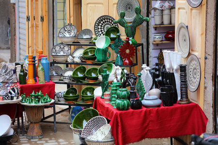 Marrakech street market artisanal products in Morocco. Moroccan handicraft ceramics in the souk.