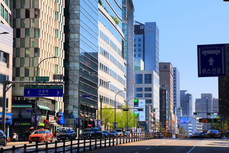 SEOUL, SOUTH KOREA - APRIL 9, 2023: Traffic in Toegye-ro street in Jung-gu district in Seoul, South Korea.のeditorial素材