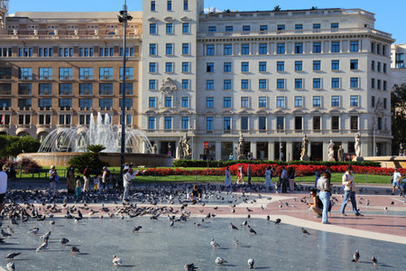 BARCELONA, SPAIN - OCTOBER 7, 2021: People visit Placa de Catalunya public square in Barcelona, Spain. Barcelona is the 2nd largest city in Spain.のeditorial素材