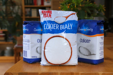 WARSAW, POLAND - AUGUST 17, 2023: White refined sugar of various brands, food products in home setting in Poland.のeditorial素材