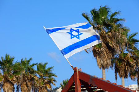 Flag of Israel in the wind. Israeli national colors.