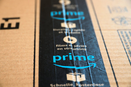 WARSAW, POLAND - AUGUST 23, 2019: Amazon Prime online shopping order delivered package in Europe. Amazon is considered one of the Big Four global tech companies.のeditorial素材