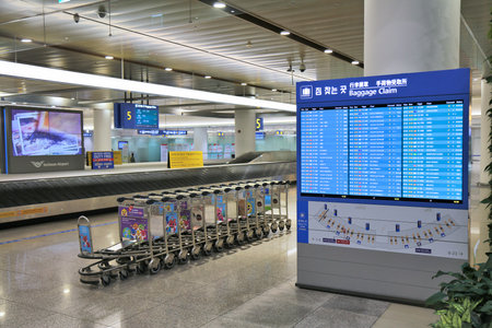 SEOUL, SOUTH KOREA - MARCH 26, 2023: Baggage claim information at Seoul Incheon Airport, the main airport of South Korea.のeditorial素材