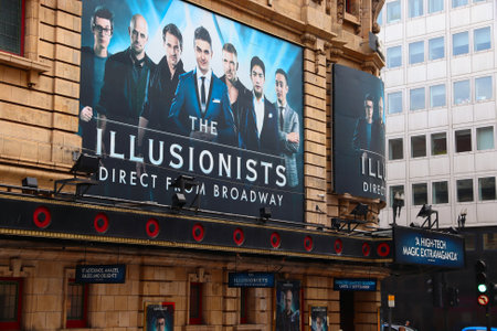 LONDON, UK - JULY 14, 2019: People walk by West End Shaftesbury Theatre playing The Illusionists in London, UK. In 2013 West End theatres sold 14.5 million tickets.のeditorial素材