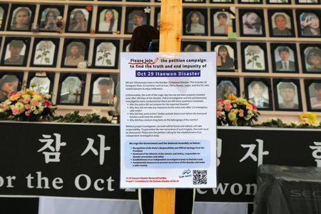 SEOUL, SOUTH KOREA - APRIL 6, 2023: Itaewon Halloween disaster truth campaign poster in downtown Seoul.のeditorial素材