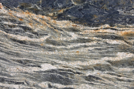 Schist rock - medium-grade metamorphic rock in New Zealand. Geology of The Remarkables mountains.