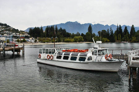 Queenstown, New Zealand. Lake Wakatipu tour boat at the downtown pier.の写真素材